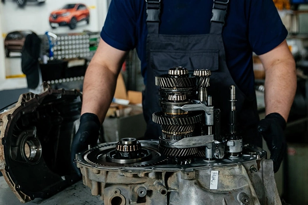 Mechanic Performing Transmission Repair in an Auto Repair Shop